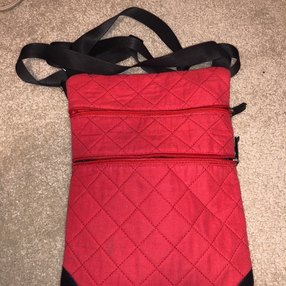red cross-body bag